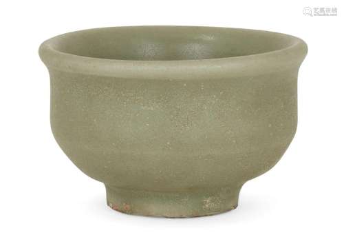 A Chinese grey stoneware celadon wine cup