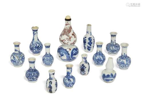 A Chinese porcelain double-gourd snuff bottle and twelve min...