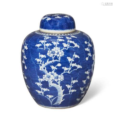 A Chinese porcelain blue and white 'prunus' jar and cover