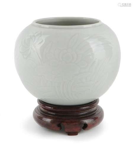 A Chinese porcelain monochrome white-glazed 'lotus' jar