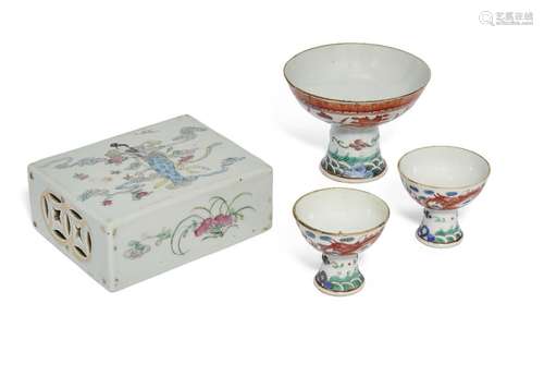 Three Chinese porcelain stem cups and a pillow