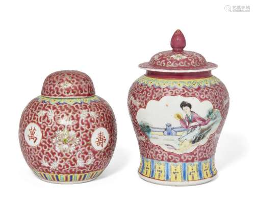 Two Chinese porcelain famille rose ruby-ground jars and cove...