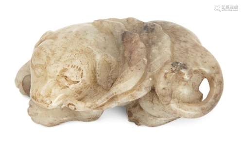 A Chinese celadon jade figure of a dog