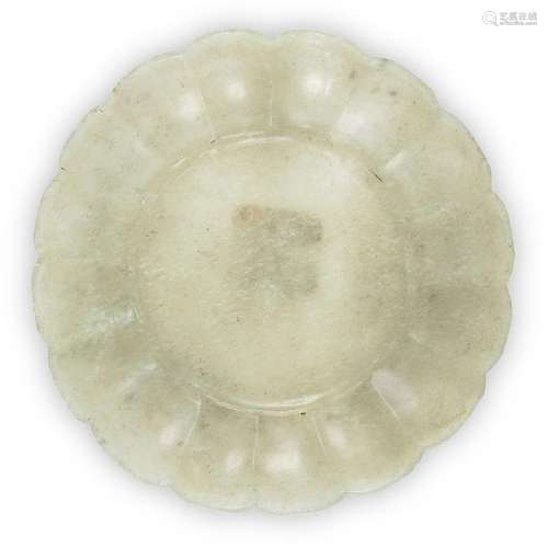 A Chinese celadon jade 'petal' dish