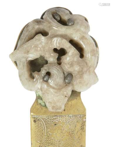 A Chinese celadon jade 'dragon' carving