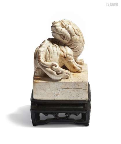 A Chinese chicken bone jade 'Buddhist lion' seal