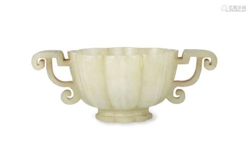 A Chinese green jade twin-handled cup