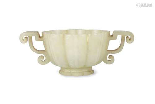 A Chinese green jade twin-handled cup