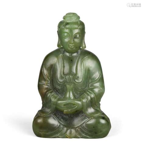 A Chinese spinach jade figure of Shakyamuni Buddha