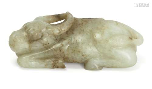 A Chinese pale green jade carving of a buffalo
