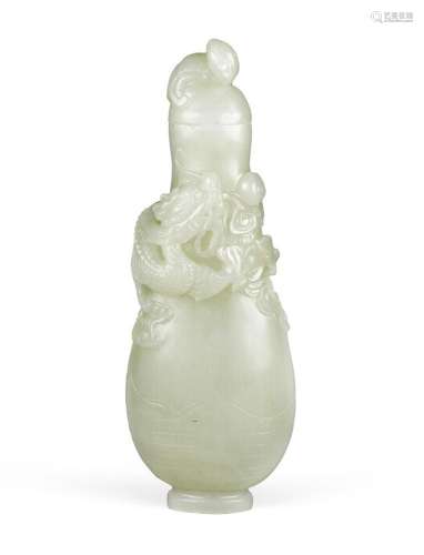 A Chinese very pale green jade 'dragon and phoenix' vase and...