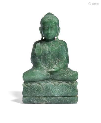 A Chinese fluorite figure of Shakyamuni Buddha
