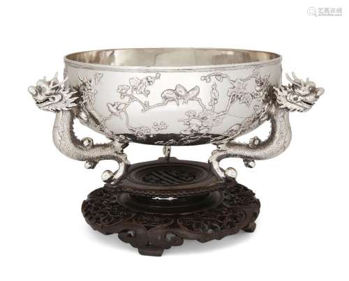 A large Chinese export silver 'dragons and prunus' bowl