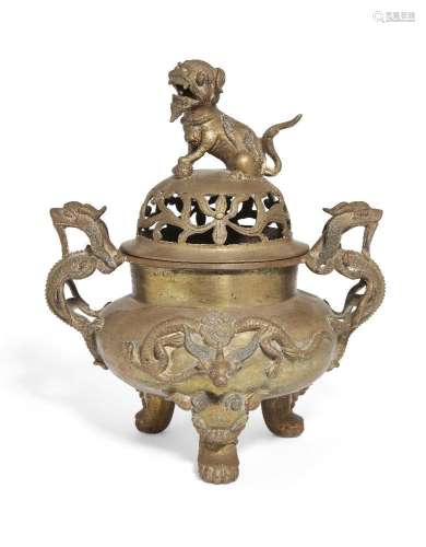 A Chinese polished bronze 'temple lion' tripod censer and co...