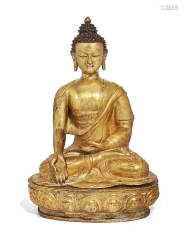 A large Sino-Tibetan gilt bronze and copper-alloy figure of ...