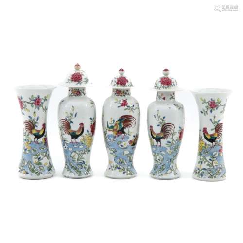 A Collection of 5 Garniture Vases