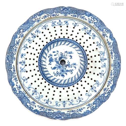 A Blue and White Strainer with Tray