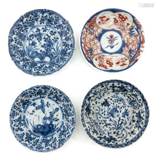 A Series of 4 Blue and White Saucers