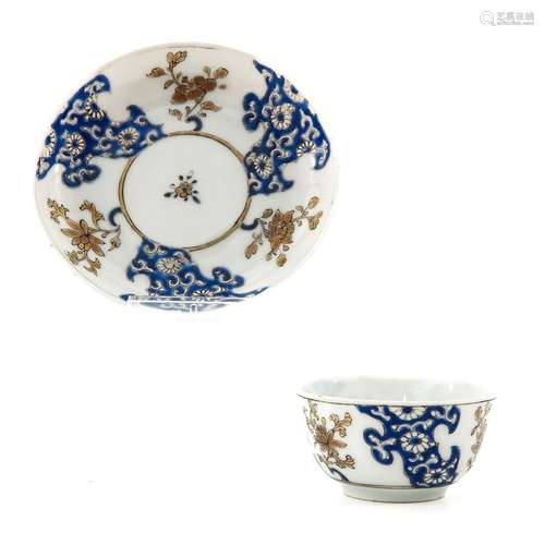 A Blue and Gilt Decor Cup and Saucers