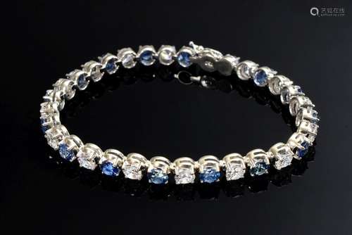 Fine WG 750 tennis bracelet with faceted sapphires (together...