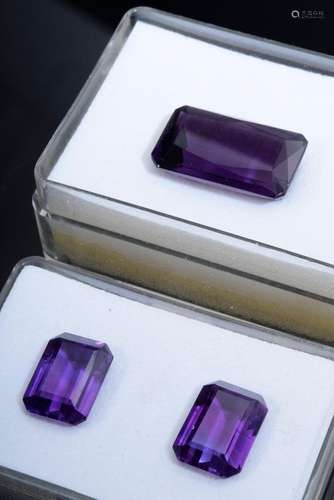 3 Various amethysts in emerald staircase cut together approx...