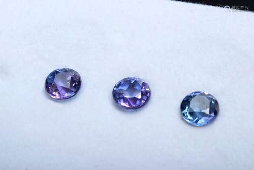 3 Unset round and faceted tanzanites total approx. 2.5ct