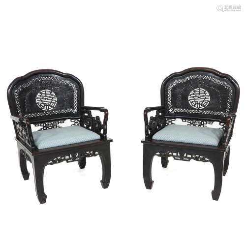 A Pair of Carved Chinese Chairs