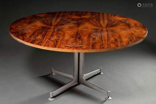 Round Midcentury dining table with simple four-legged steel ...