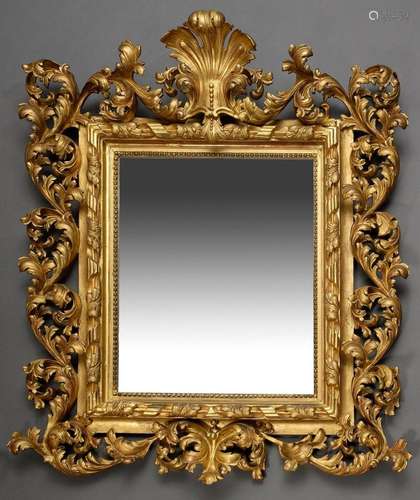 Opulently carved and gilded mirror in baroque style around 1...