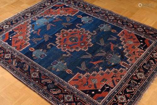 A firmly woven Afshar carpet with a red stepped central meda...