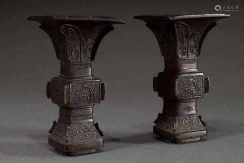 Pair of Chinese bronze "Gu" vases with archaic rel...