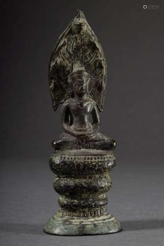 Bronze "Sitting Buddha sheltered by the Naga King Mucha...