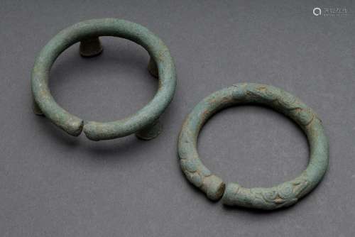 2 Various parts: Bronze bangle with base and ornamental reli...