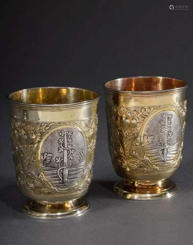 Pair of Hamburg vermeil cups each with three chased and chas...