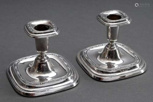 Pair of low Swedish candlesticks with angular base and ornam...