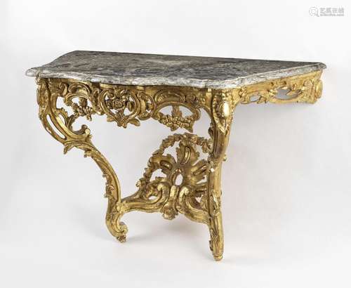 Console d'époque Louis XV<br />
Bois sculpté et doré à décor...