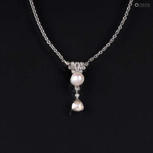 An Art Nouveau Diamond Pendant with Pearl.