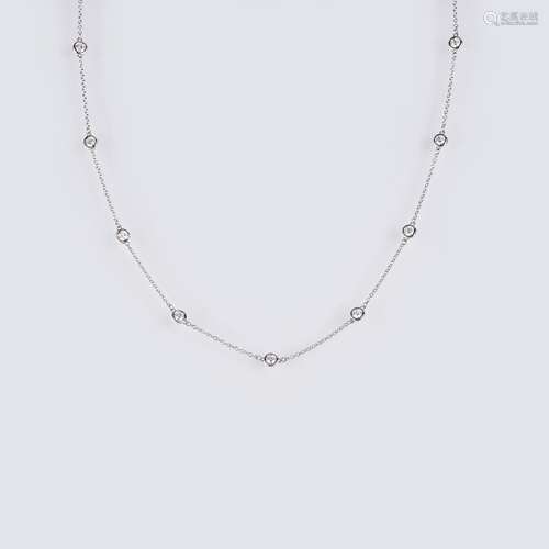 A long Diamond Necklace.