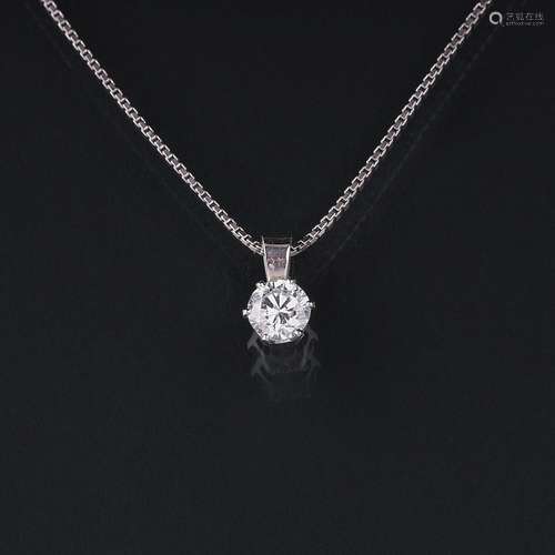 A Solitaire Diamond Pendant on Necklace.