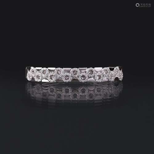 A Diamond Bangle Bracelet.