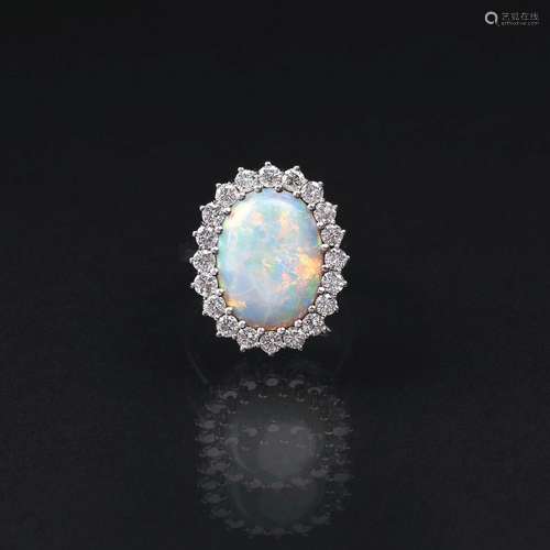 An Opal Diamond Ring.