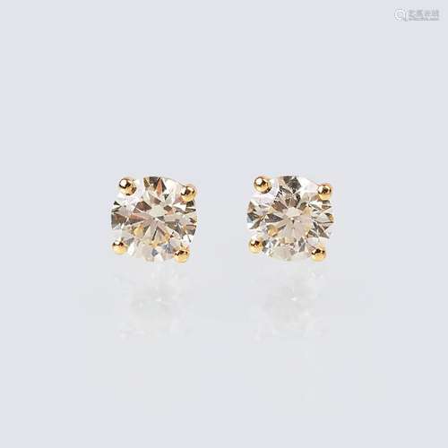 A Pair of Solitaire Diamond Earstuds with Fancy Diamonds.