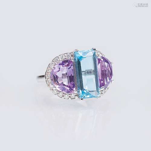 An Aquamarine Amethyst Ring with Diamonds.