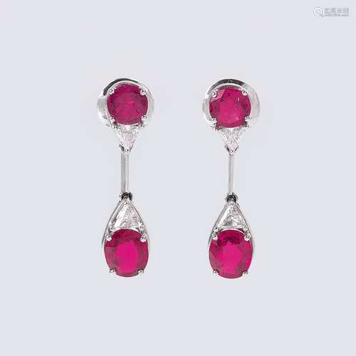 A Pair of Ruby-Sapphire Earpendants with River Diamonds.