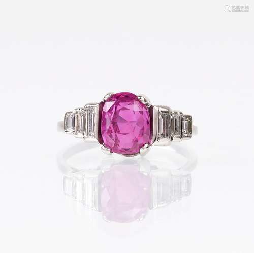 A Natural Pink Sapphire Ring with Diamonds.