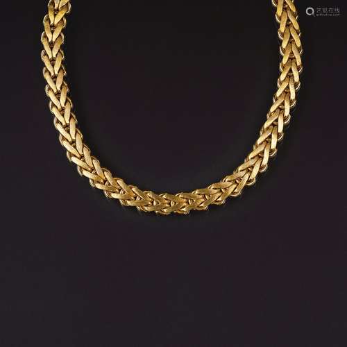 A Gold Necklace.