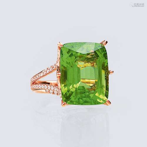 A Cocktail Ring with Peridot and Diamonds.