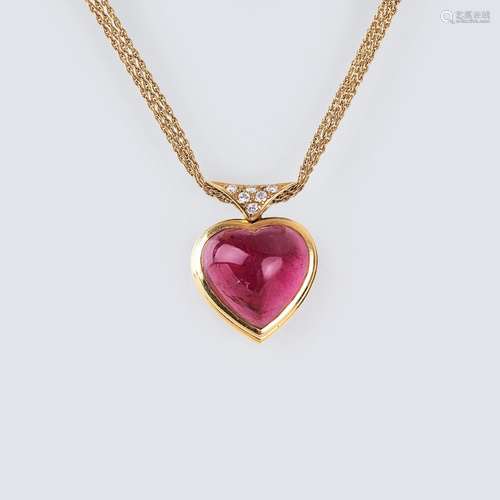 A heartshaped Rhodolite Pendant with Diamonds.