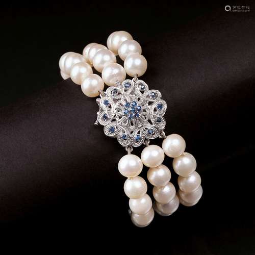 A Pearl Bracelet with Sapphire Clasp.