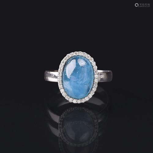 An Aquamarine Diamond Ring.